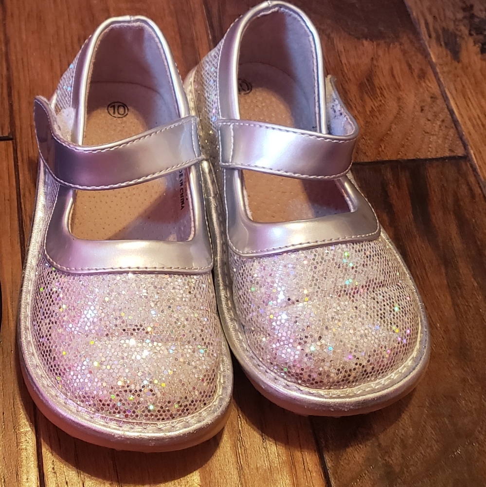 Silver squeaky shoes